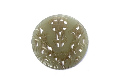 An Antique Chinese Carved Jade Medallion Depicting Central Bat Motifs