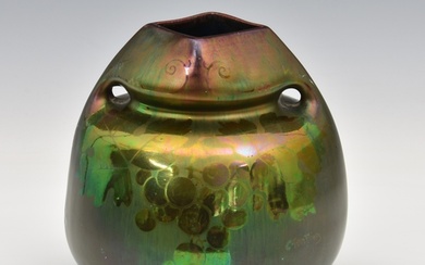 An Art Nouveau Art Pottery vase with metallic / lustre glaze...