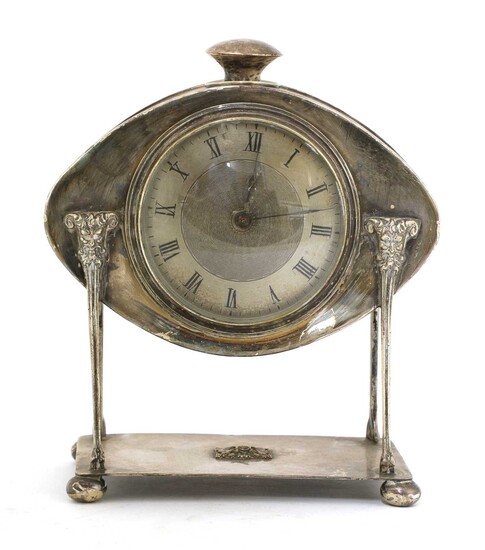 An Arts and Crafts silver-plated desk clock