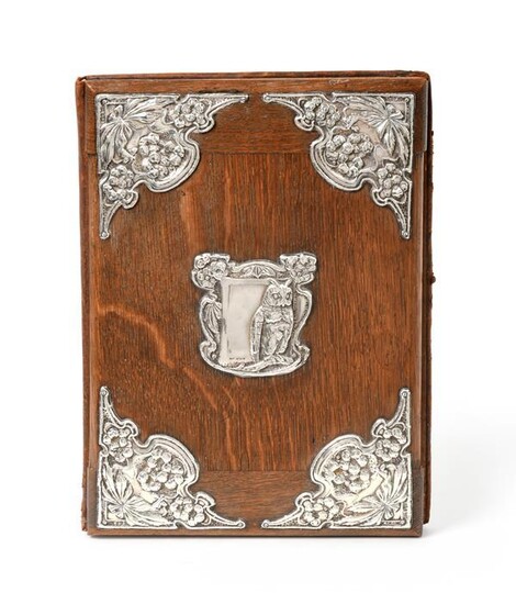 An Edward VII Silver-Mounted Oak Desk-Blotter, by J. Aitkin and...