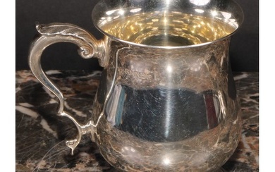 An Elizabeth II silver bell shaped mug, of George II design,...