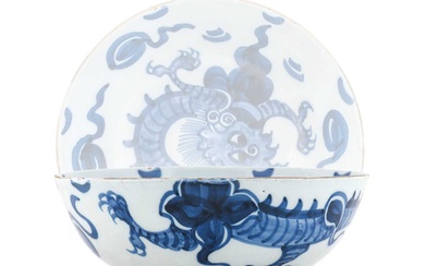 An English Delft Bowl, mid 18th century, painted in blue...