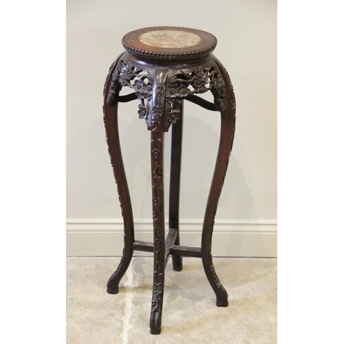 An early 20th century Chinese carved hardwood and rouge marb...