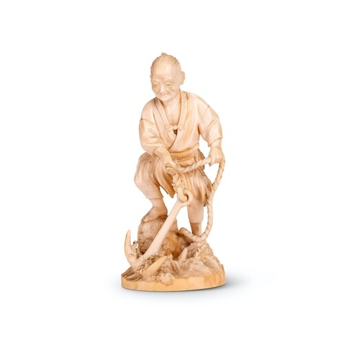 An early 20th century Japanese ivory okimono figure of a sai...