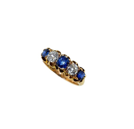 An early 20th century sapphire and diamond five stone ring