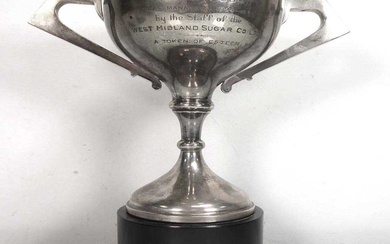 An early 20th century silver two handled trophy vase of...