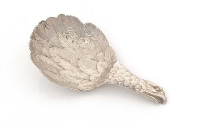 An early Victorian silver "eagle's wing" caddy spoon.
