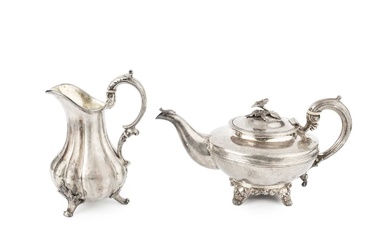 An early Victorian silver teapot, with reeded compressed body, foliate...