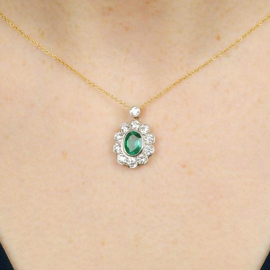 An emerald and brilliant-cut diamond cluster pendant