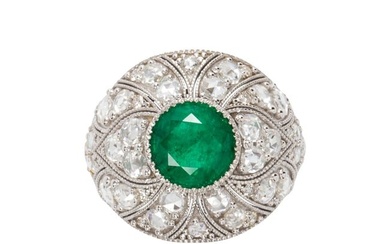 An emerald, diamond and 14k white gold ring
