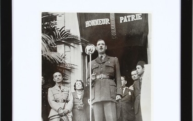 An original black-and-white press photograph of the French general Charles de Gaulle (1890–1980) during a speech in North Africa on August 30th 1942.