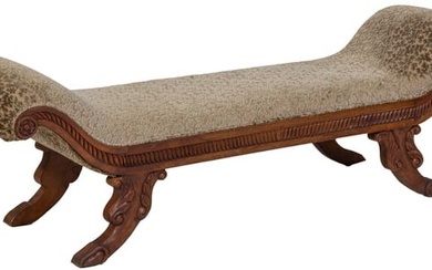 Anglo-Indian Style Carved Walnut Day Bed/Bench, 20th c., with rolled arms with bossed ends, above a