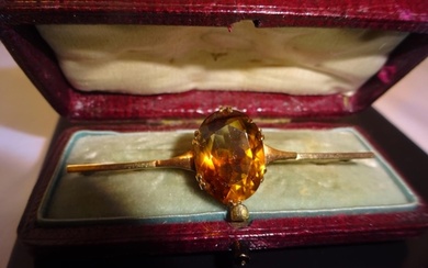 Antique 9ct gold stick brooch with large citrine.