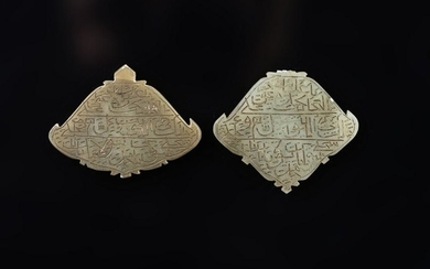Arte Islamica Two jade pendants engraved with pious