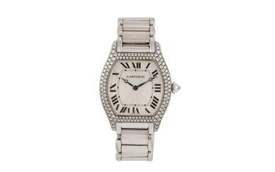 CARTIER. TORTUE 18K WHITE GOLD AND DIAMONDS.