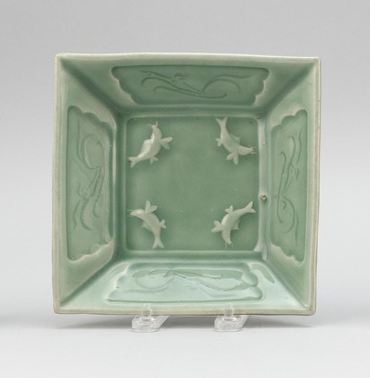 CHINESE LONGQUAN CELADON PORCELAIN SQUARE DISH Four raised carp on interior and incised cartouches about the four edges. Height 2"....