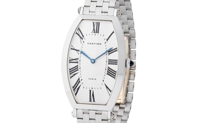 Cartier Paris. Very Rare Tonneau-Shape Wristwatch in Platinum, Reference 2435, With Silver Guillochè Roman Numbers Dial, Box, Warranty and Platinum Bracelet