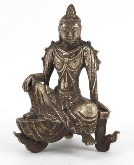 Chinese silver coloured metal figure of a deity, 23.5cm
