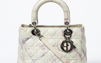 NOT SOLD. Christian Dior: "Special Edition Lady Dior" A bag of white/lilac/pink cannage leather with silver tone hardware. – Bruun Rasmussen Auctioneers of Fine Art