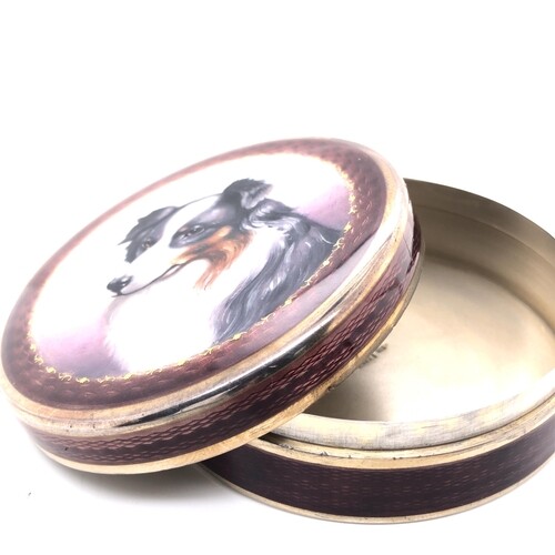 Circular enamel box with a portrait of a border collie. The ...