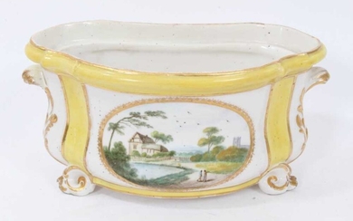 Derby yellow-ground bough pot, circa 1790-1800, polychrome painted with landscape scenes, with scrolling handles and feet, 18.5cm wide