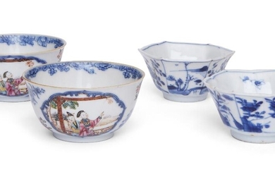 Four Chinese tea bowls, 18th century, comprising a pair painted in underglaze blue with panels of floral sprays, 4cm high, and a pair painted in underglaze blue and famille rose enamels with panels of figures amid floral sprays, 8cm diameter (4)...
