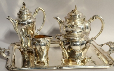 GALLIA Partie de service à thé en métal argenté, modèle rocaille comprenant : - un...