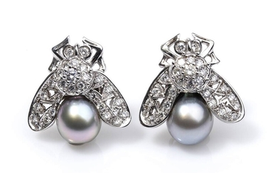 Gold, diamonds and pearls earrings 18k white gold, depicting a...
