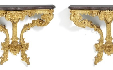 Jules Degoullons, attributed: A pair of Régence giltwood console tables. France, c. 1720. H. 87 cm. W. 116 cm. D. 49 cm. (2)