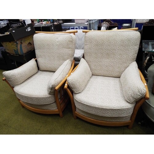 Matched pair of Ercol stick back armchairs in excellent cond...