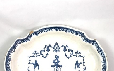 Moustier. Violin-shaped earthenware dish. Decorated in cobalt blue...