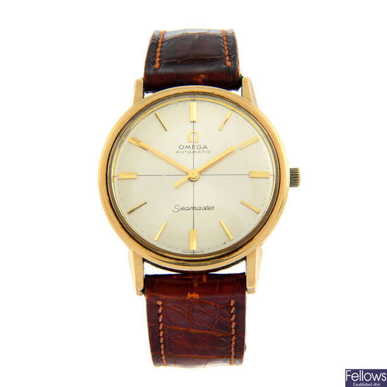 OMEGA - a yellow metal Seamaster wrist watch, 34mm.