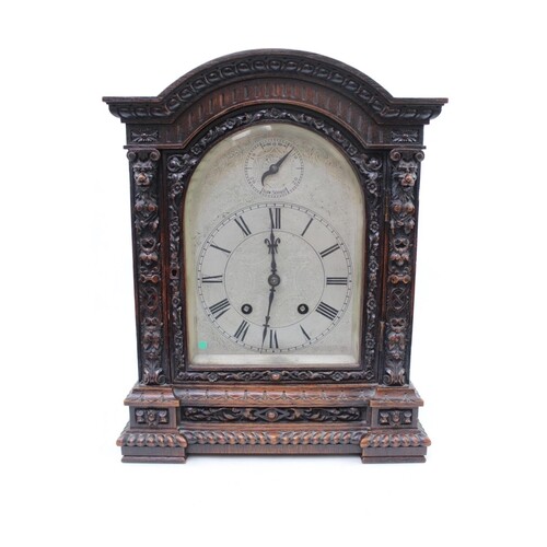 Oak cased 19thC Bracket clock with highly carved domed case....