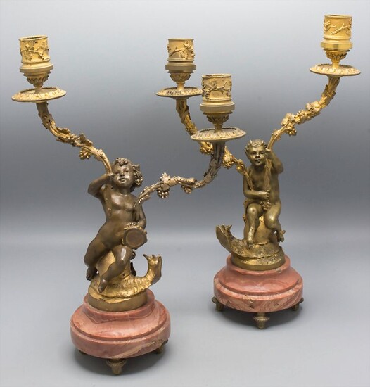 Paar figürliche Bronzeleuchter / A pair of figural candleholders with a girl and a faun...