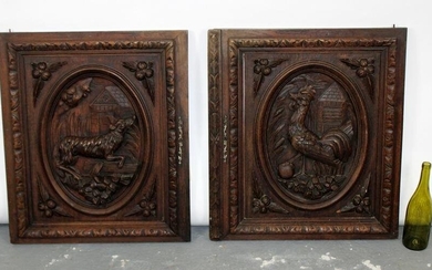 Pair of French relief carved oak panels