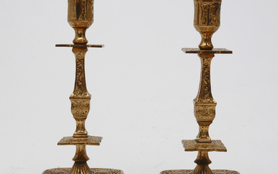 Pair of brass candlesticks, based on models inspired by Barbedienne.