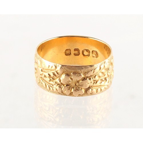 Property of a lady - an 18ct gold fancy band ring, size N/O,...