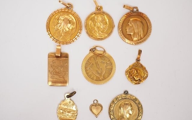 Set of six yellow gold medals.