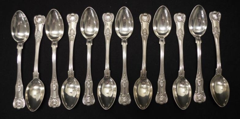 Set twelve German silver dessert spoons 'Kings' pattern decoration,...