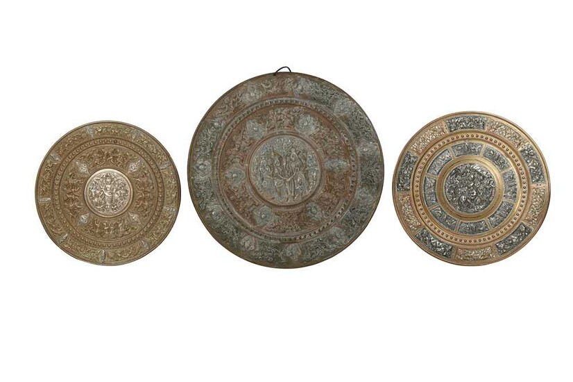 THREE COPPER AND SILVER-INLAID TANJORE TRAYS Thanjavur (Tanjore), Tamil Nadu, South India, 19th - 20th century