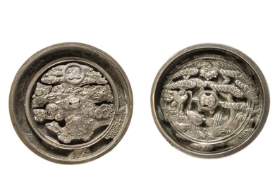 TWO JAPANESE BRONZE MIRRORS, EDO PERIOD, the relief cast cen...