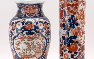 TWO JAPANESE IMARI PORCELAIN VASES A cylindrical vase with floral design, height 12", and a baluster-form vase with flower garden ca...