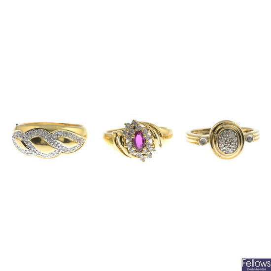 Three gold diamond and ruby rings.