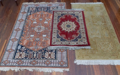 Three small Persian woollen rugs, largest 155 x 94cm