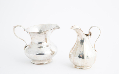 Two 800 silver pourers, gr. 980 ca. 20th c.