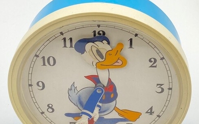 Un réveil Donald Duck du début des années 1970. Fabriqué par Bayard. La tête bouge...