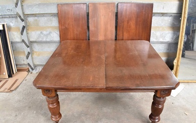 Very large Edwardian mahogany extending dining table, with three additional leaves