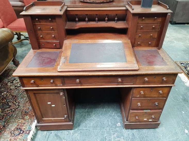 Victorian Mahogany Dicken's Style Desk, with gallery back and eight trinket drawers, burgundy writing surfaces & eight drawers below...