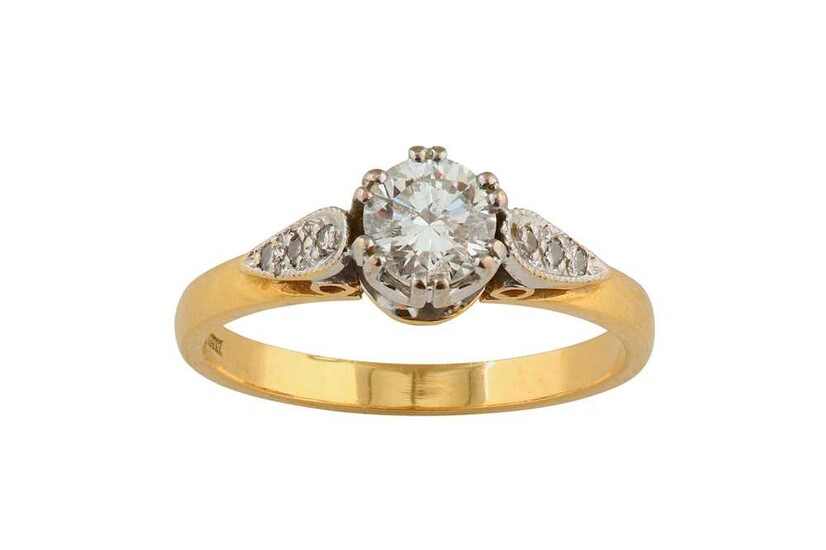A diamond single-stone ring The brilliant-cut diamond, between single-cut...