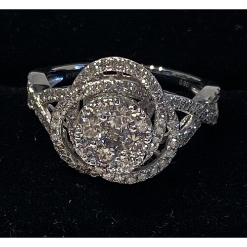 18CT WHITE GOLD DIAMOND CLUSTER RING in a swirling wave desi...